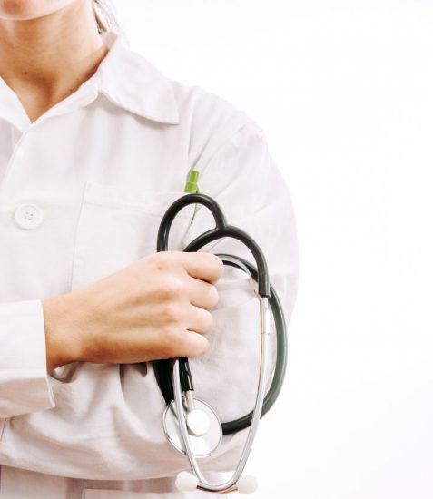 Doctor with stethoscope and white coat Doctor with stethoscope and white coat